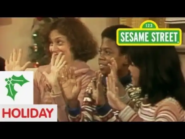 Video: Sesame Street Cast — "Keep Christmas With You All Through the Year"
